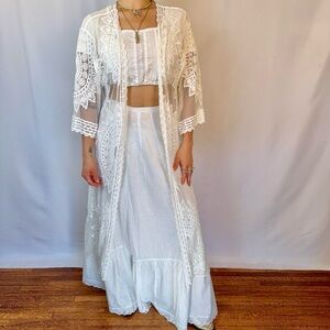 Y2K stylist Rachel Zoe’s White lace cardigan. Boho lace duster.